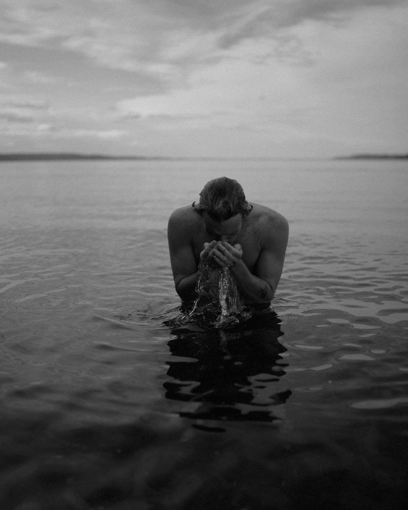 Man washing in the sea